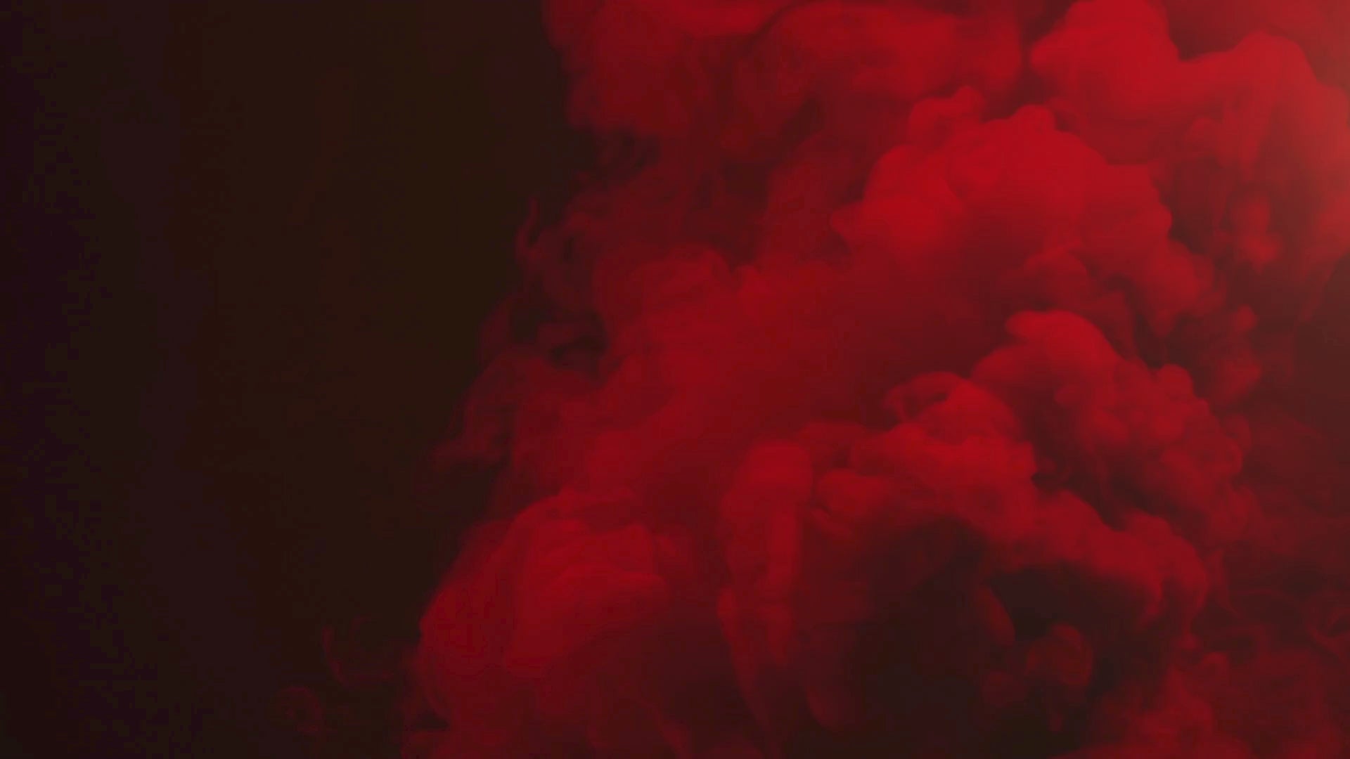 Load video: Book covers and descriptions against a billowing red smoke background.